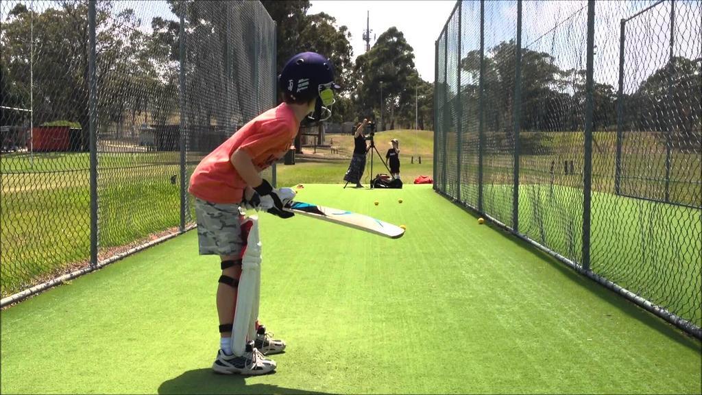 The Corinthians Resort And Club Пуна Экстерьер фото A child playing cricket